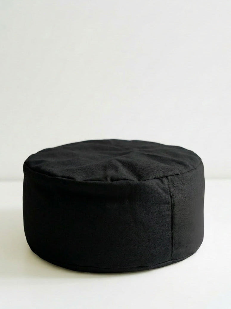 Black BODHi meditation cushion on a white background