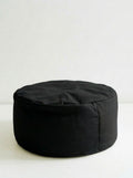 Black BODHi meditation cushion on a white background
